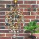 Old chandelier has tassels