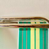 Vintage folding beach chair in chrome metal and woven plastic