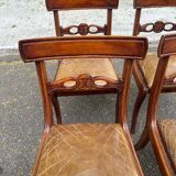 4 Regency chairs in solid wood and brown-beige leather from the 19th century.