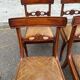 4 Regency chairs in solid wood and brown-beige leather from the 19th century.
