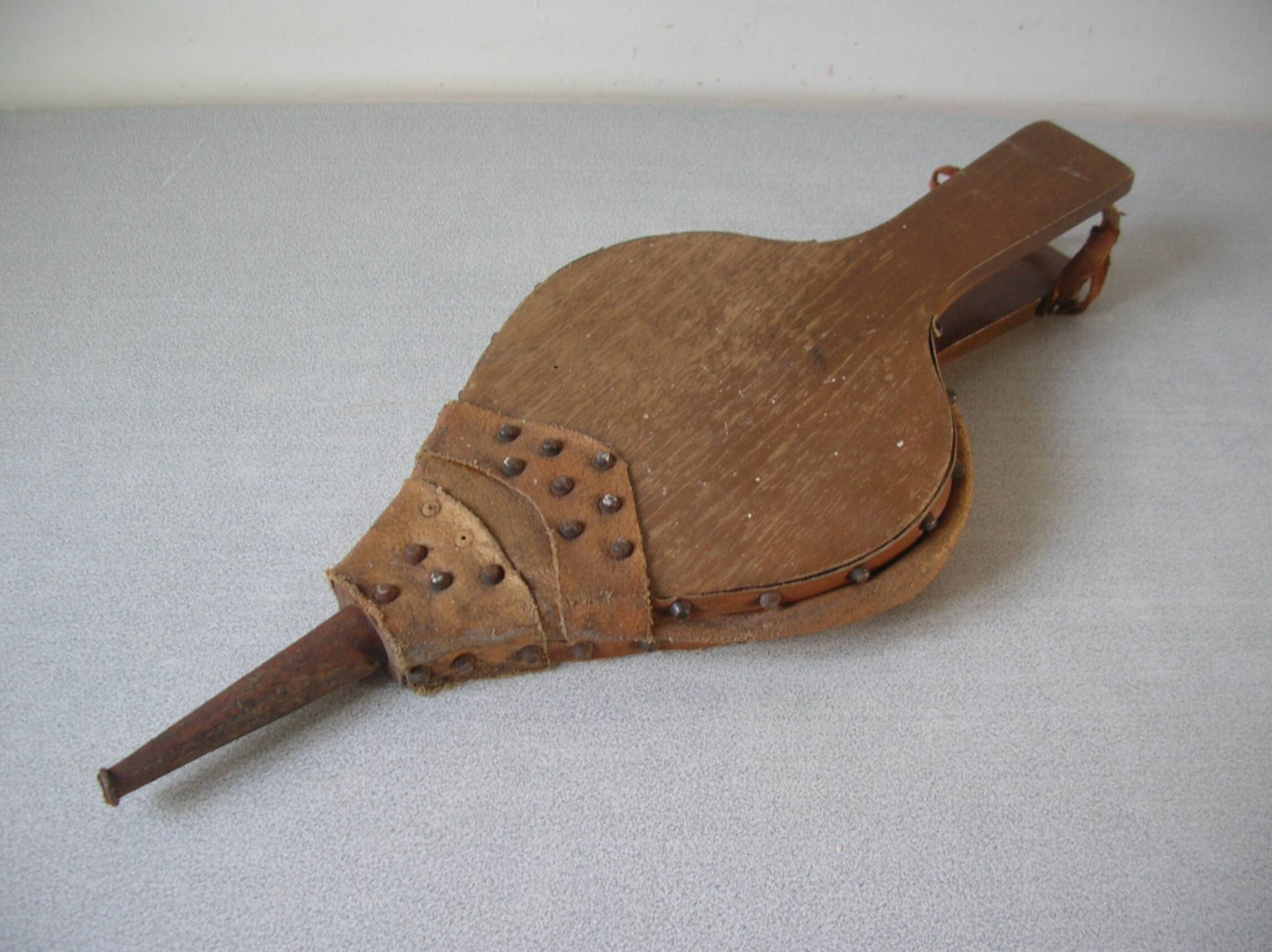 Old wooden and leather fireplace bellows works tool accessory