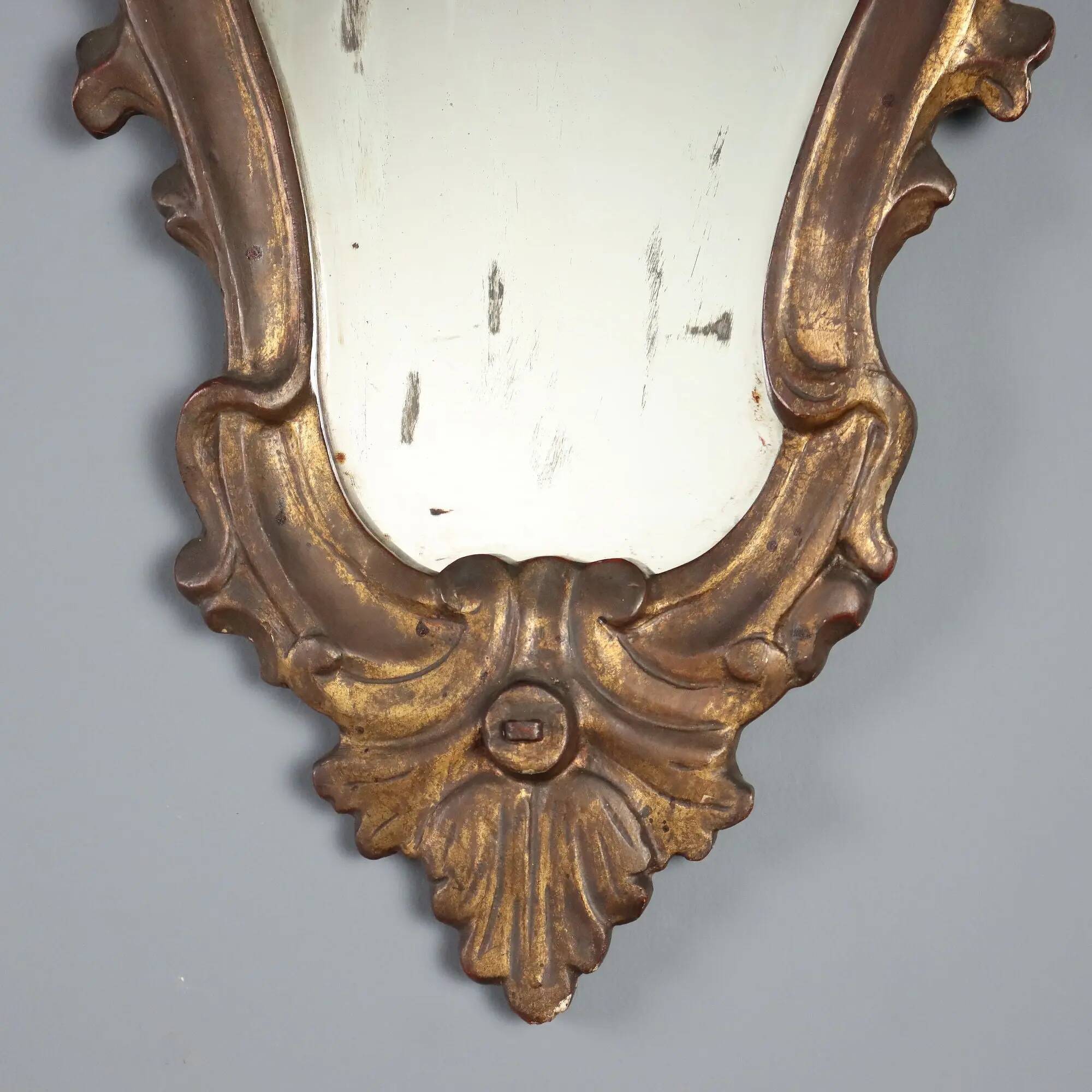 Small antique mirrors in carved and gilded wood, Italy, 20th century.