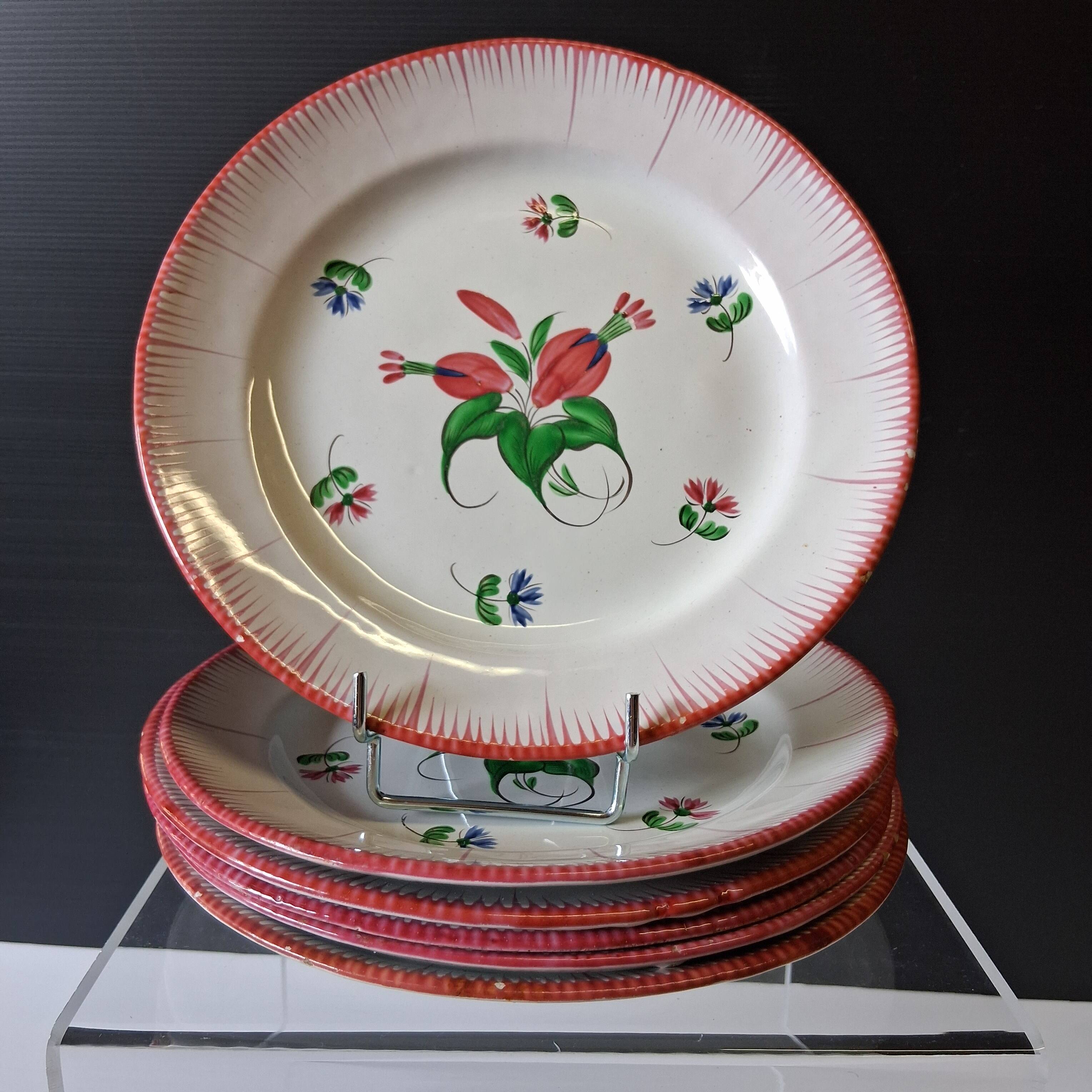 6 antique flat plates in earthenware in good condition.