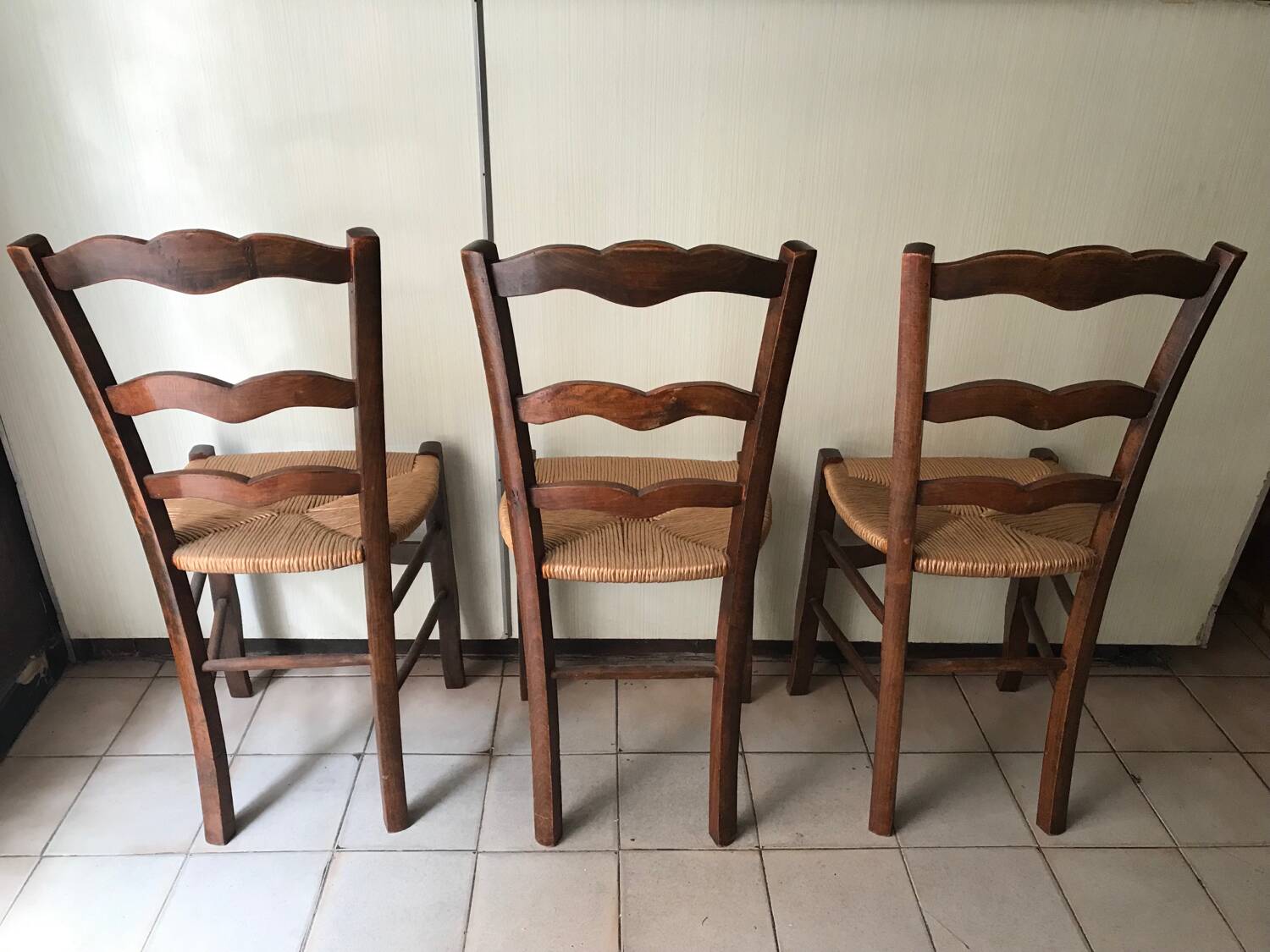 Wooden and straw chairs