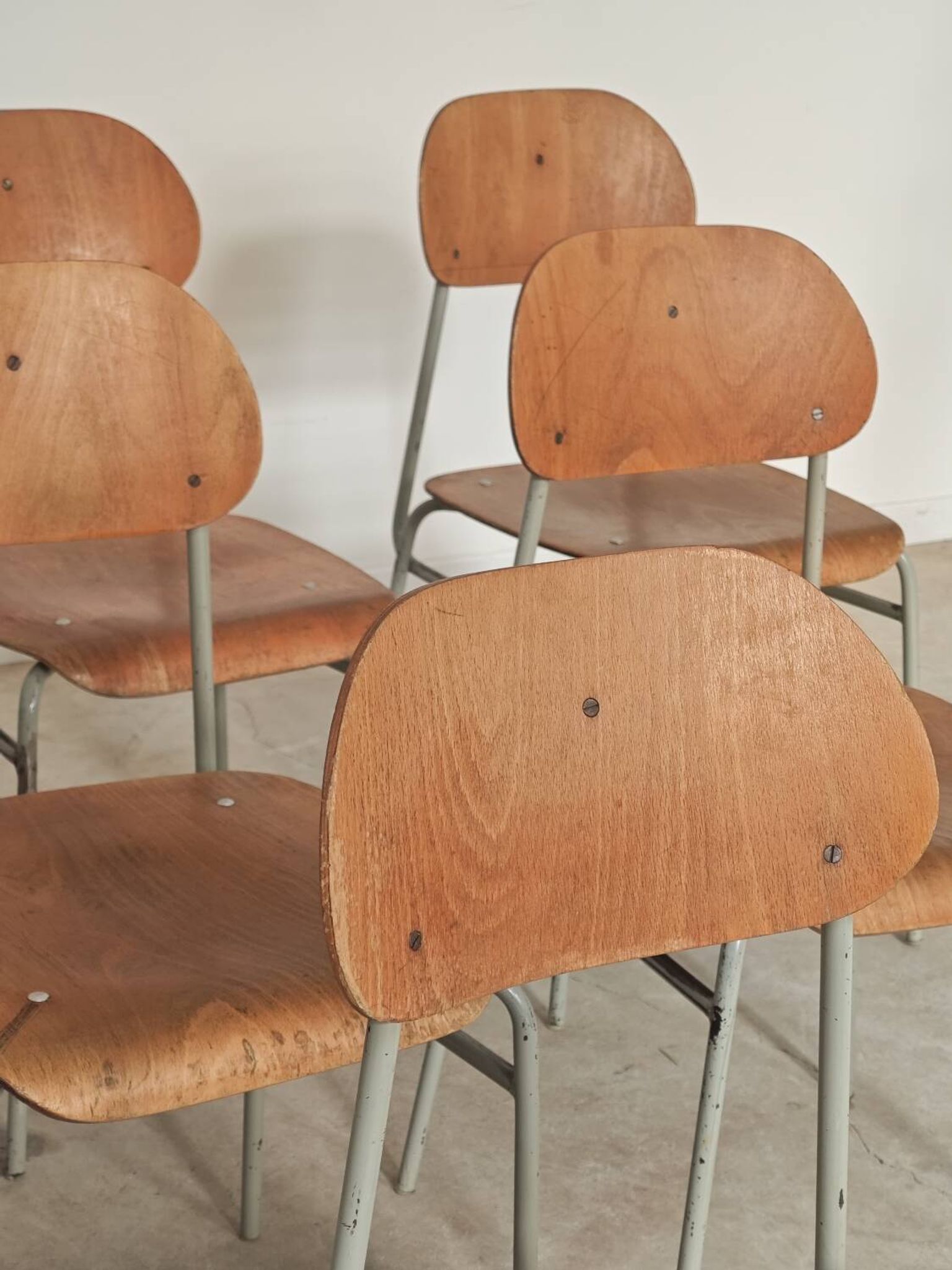 Set of 8 metal and wood school chairs  
Ex Czechoslovakia 1960