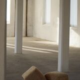 French mid-century cube poufs, a pair of lambswool stools, 1960s.