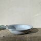Round, flat, sky-blue ceramic salad bowl from Moulin des Loups