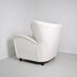 Fauteuil à oreille en bouclette
