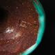 Cup on a pedestal or chalice in cloudy lagoon green glazed terracotta