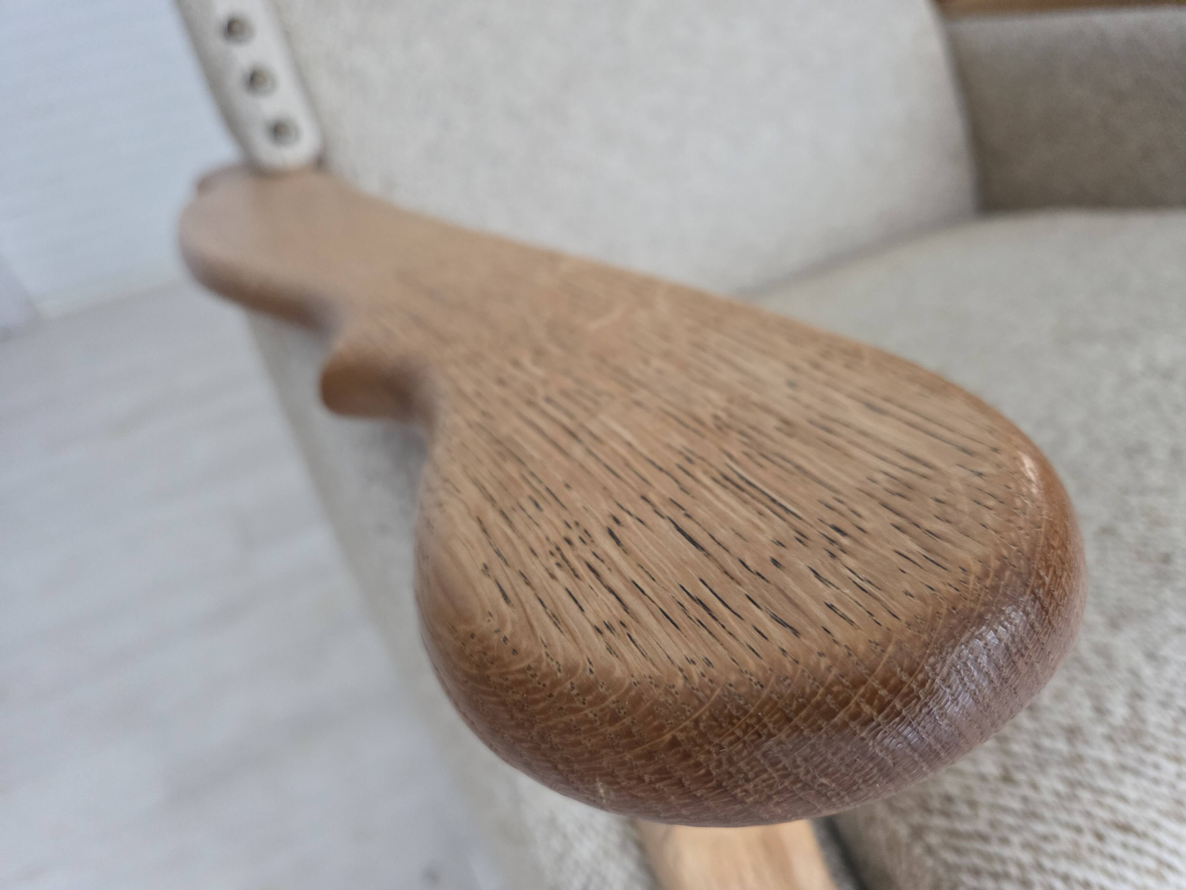 1970s, Danish highback armchair, furniture wool, solid oak wood.