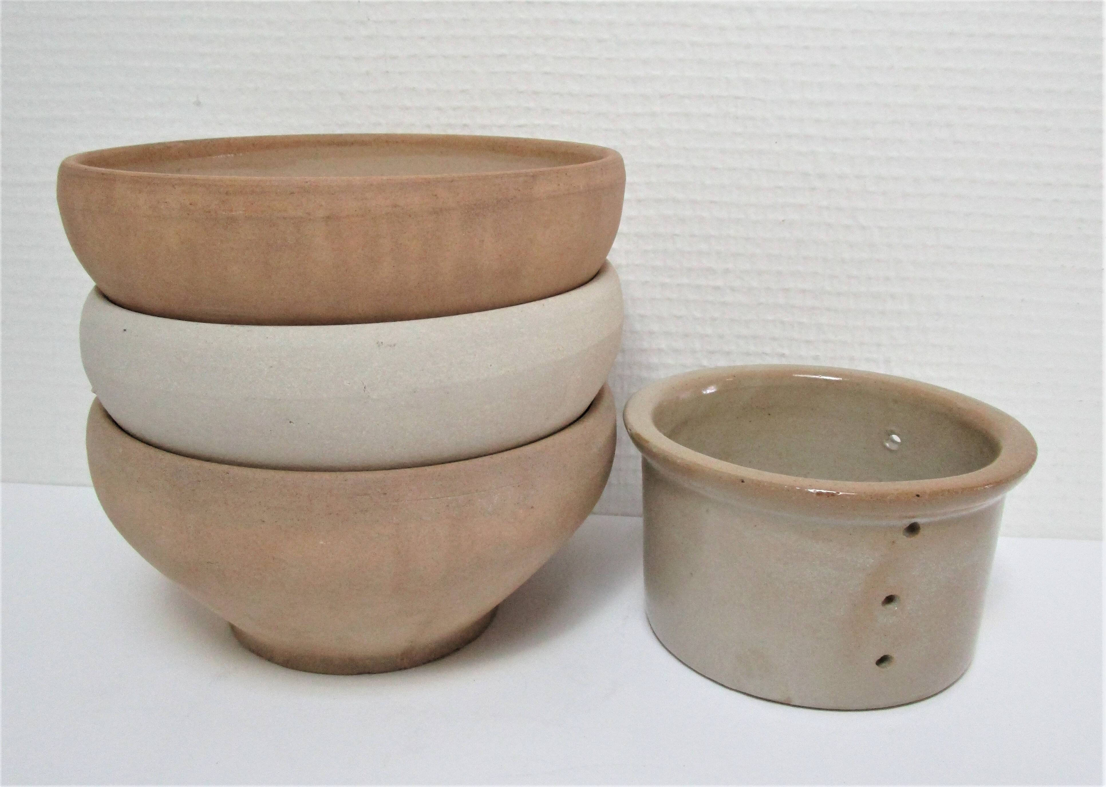 Three XL bowls and old stoneware dish