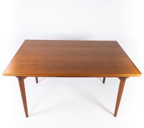 Dining table in teak with extentions of danish design from the 1960s.