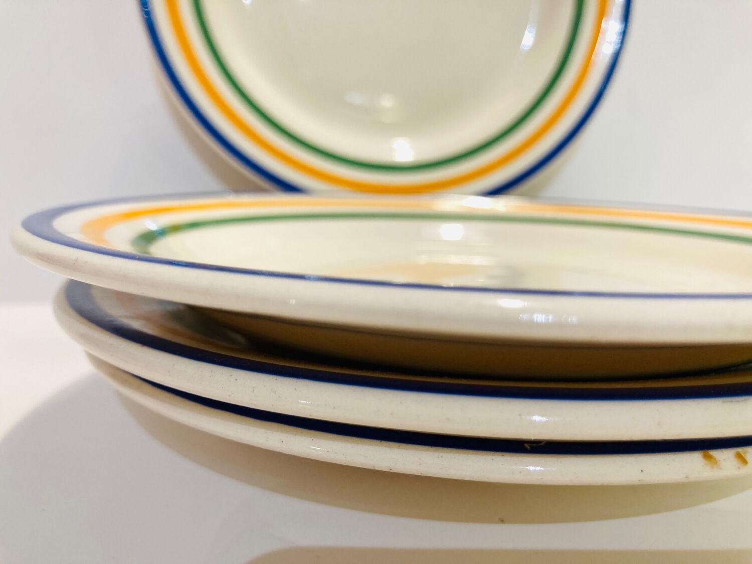 4 striped earthenware plates made in Romania