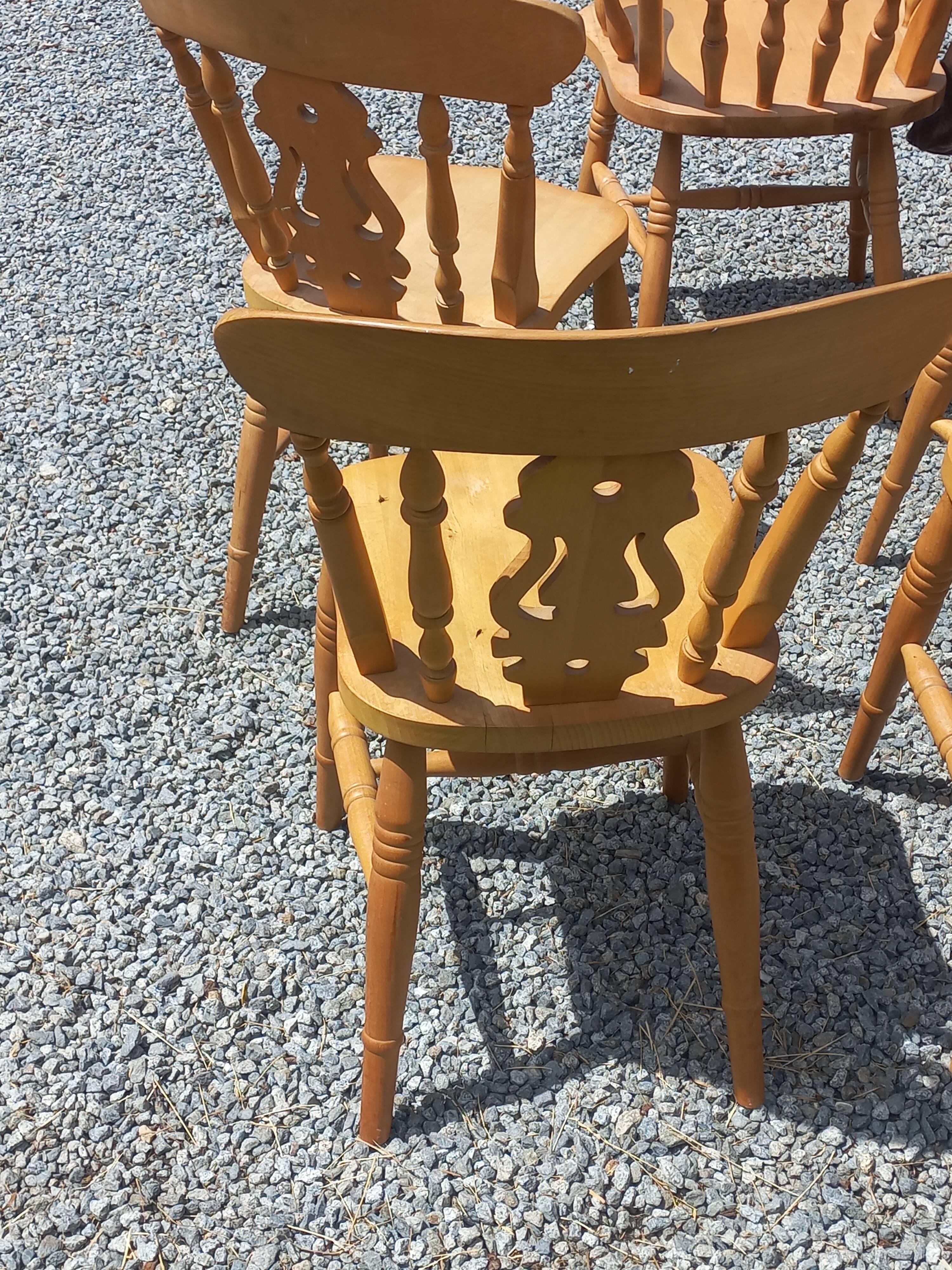 Set of 4 chairs and 1 armchair in mountain style.