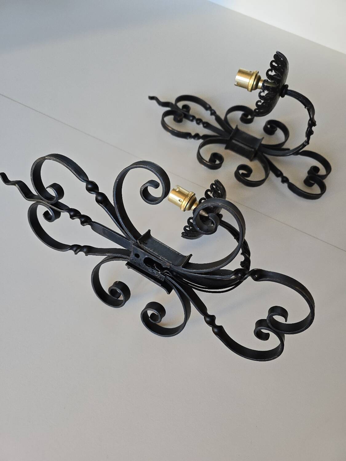 Pair of wrought iron wall sconces