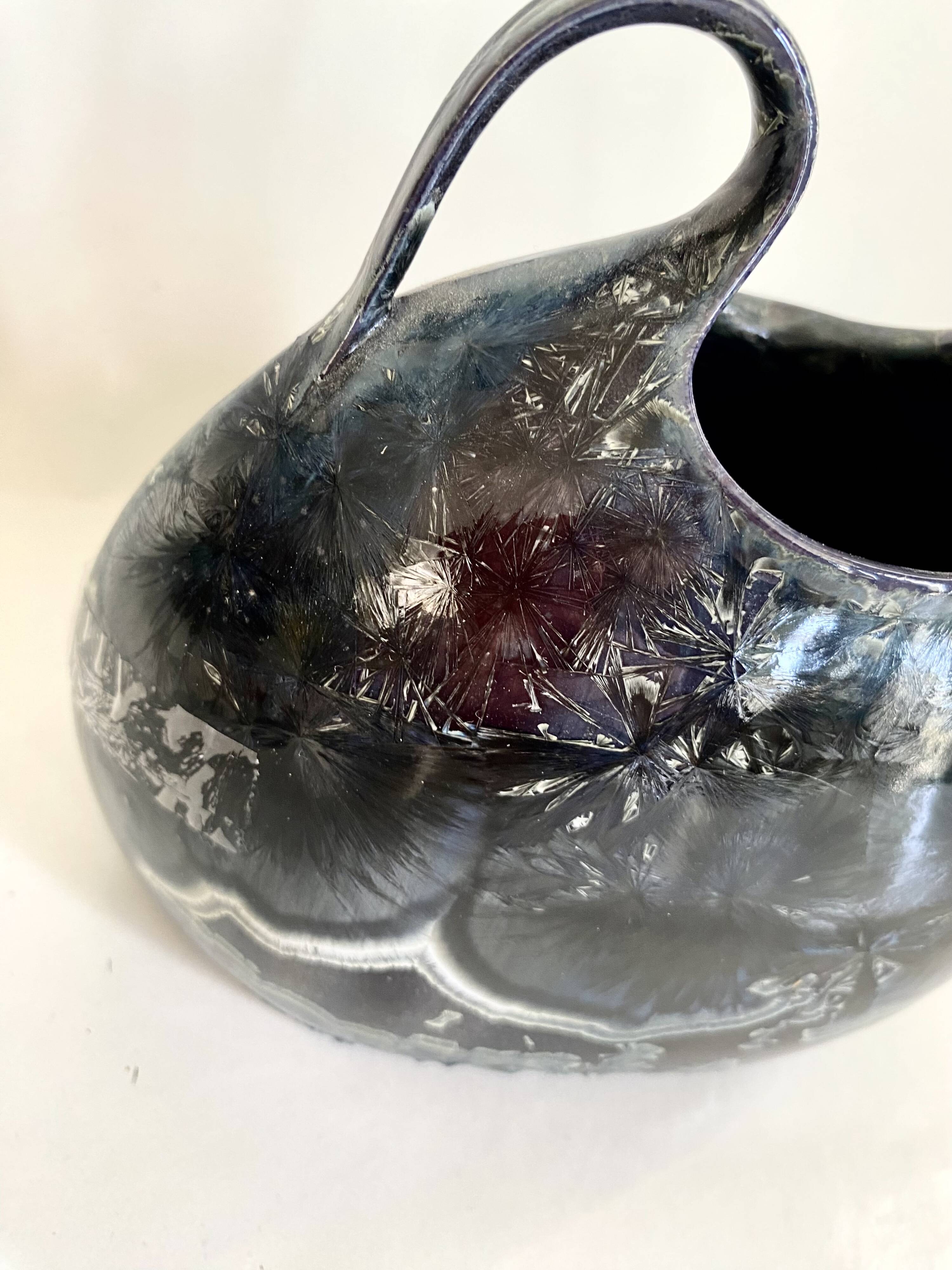 Iridescent ceramic vase with handles