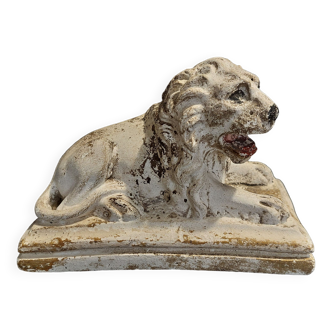 Lying lion plaster statuette