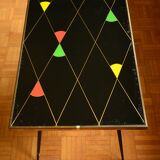 Brass and glass coffee table with compass feet