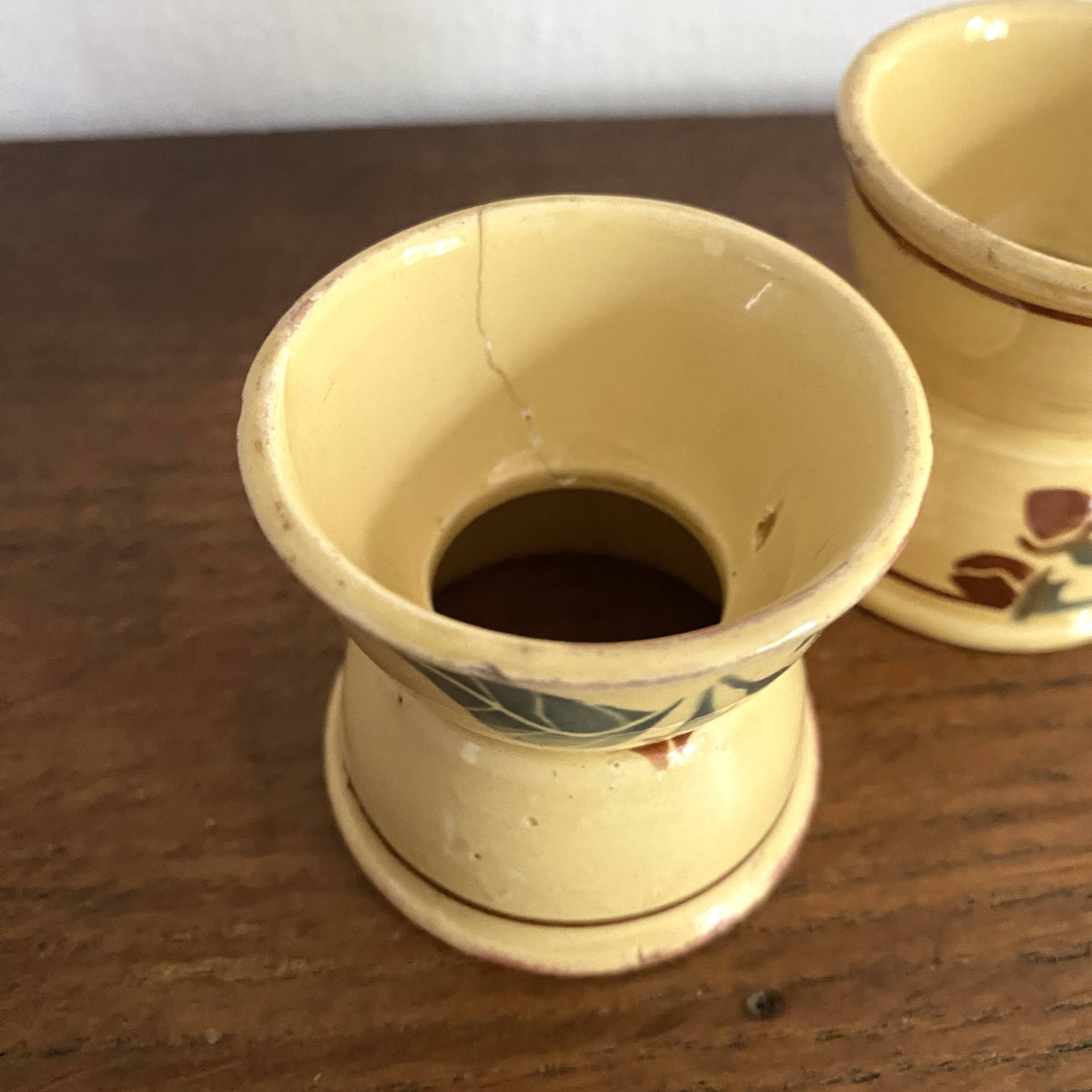 Antique diabolo egg cups