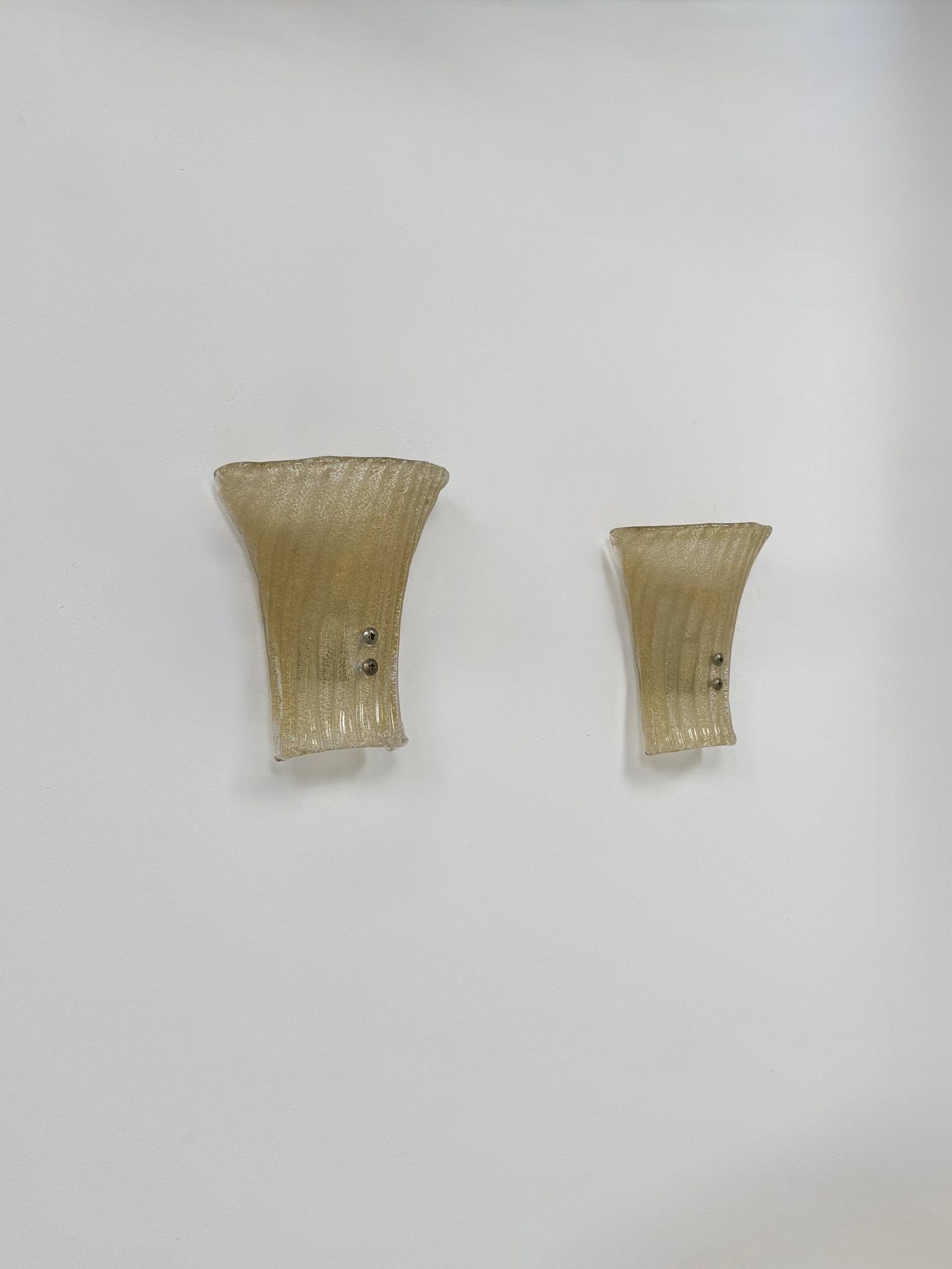Pair of vintage Murano glass wall lights, pressed moulded, Italy, 1980.