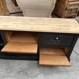Old workshop furniture transformed into a TV unit.