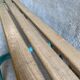 Vintage wood kindergarten bench and tubular structure in long