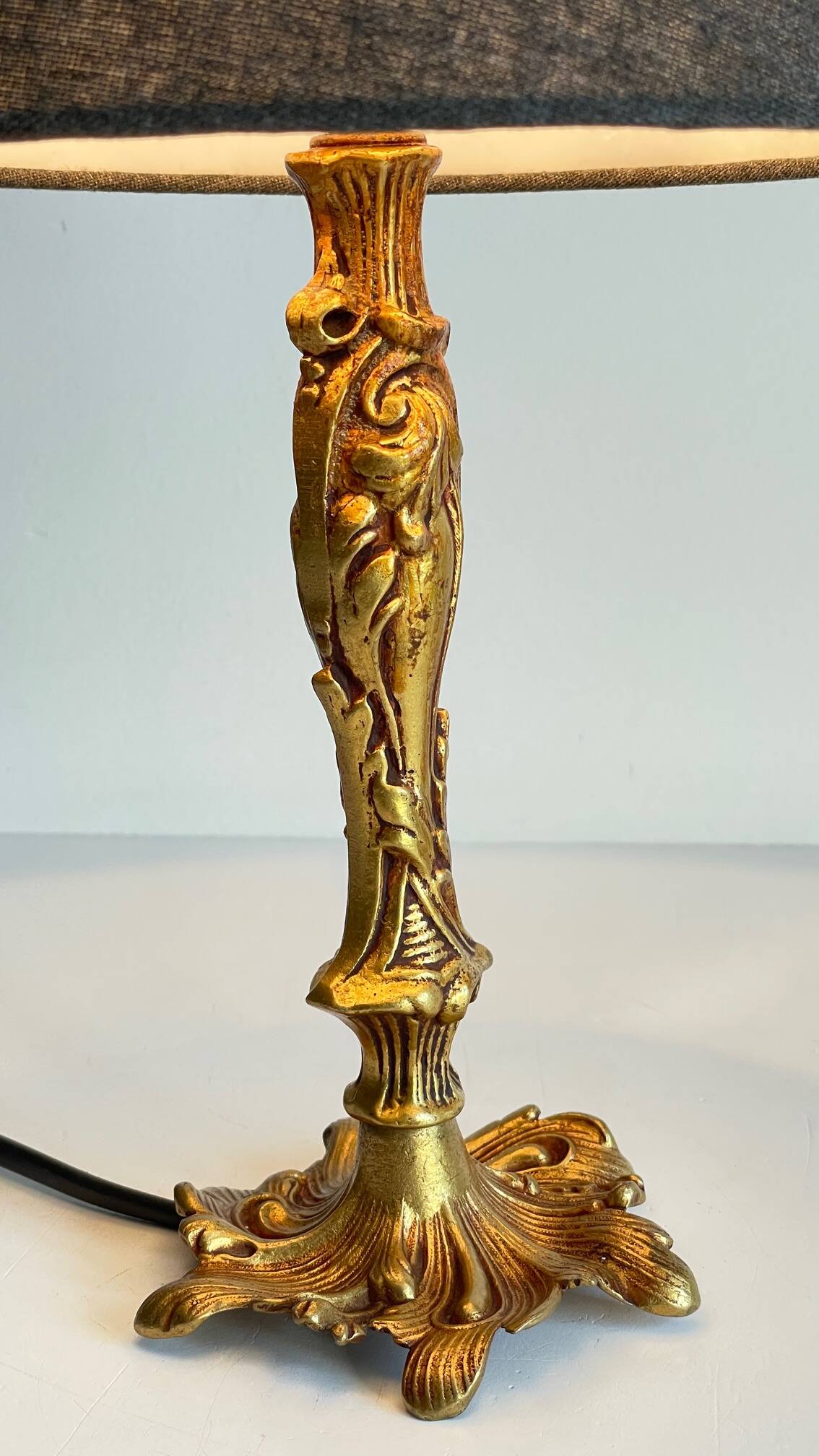 Chic bronze lamp with vintage gold patina