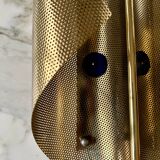 Pair of perforated brass wall lights by Christoph Palme, Germany, 1980s.