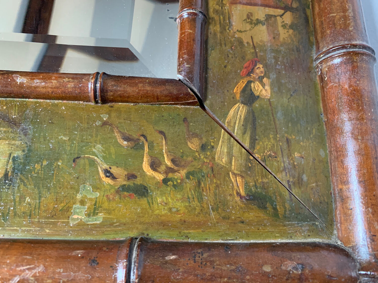 Bamboo wood mirror and 19th-century paintings