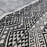 Handwoven black and white rug