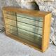 Large pharmacy wall display case in light oak - vintage 1960
