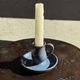 Vintage hand-held candlestick in blue glazed stoneware with floral decoration by Poterie Millian.