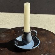 Vintage hand-held candlestick in blue glazed stoneware with floral decoration by Poterie Millian.