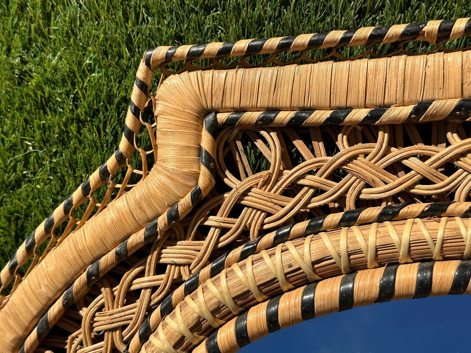 Sculptural mirror in rattan and natural wicker, 1970
