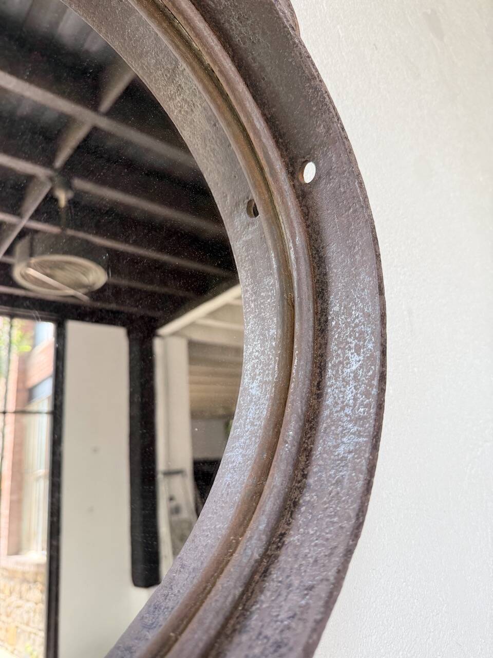 Brutalist mirror with metal chain from the 50s
