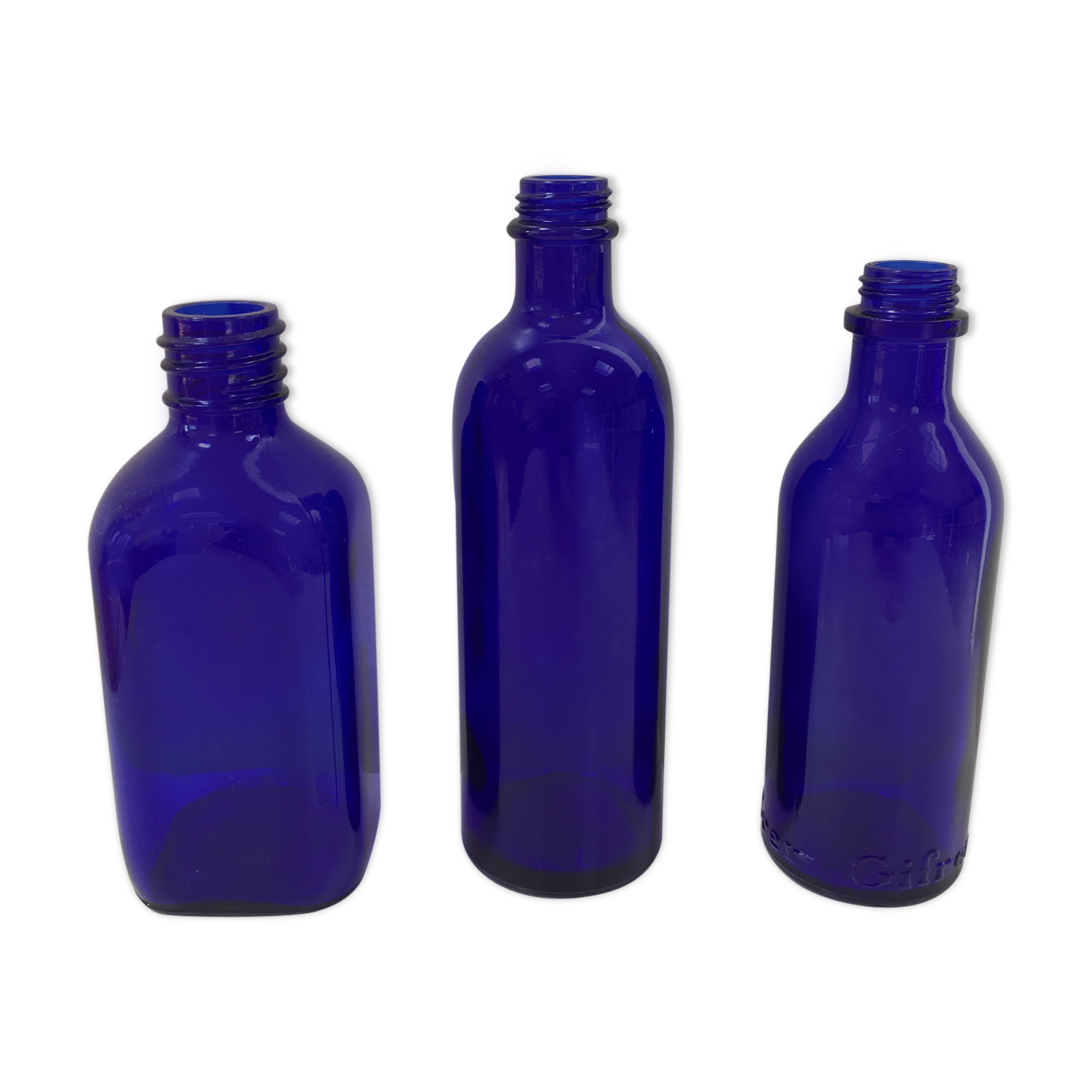 Trio de bouteilles bleues de pharmacie