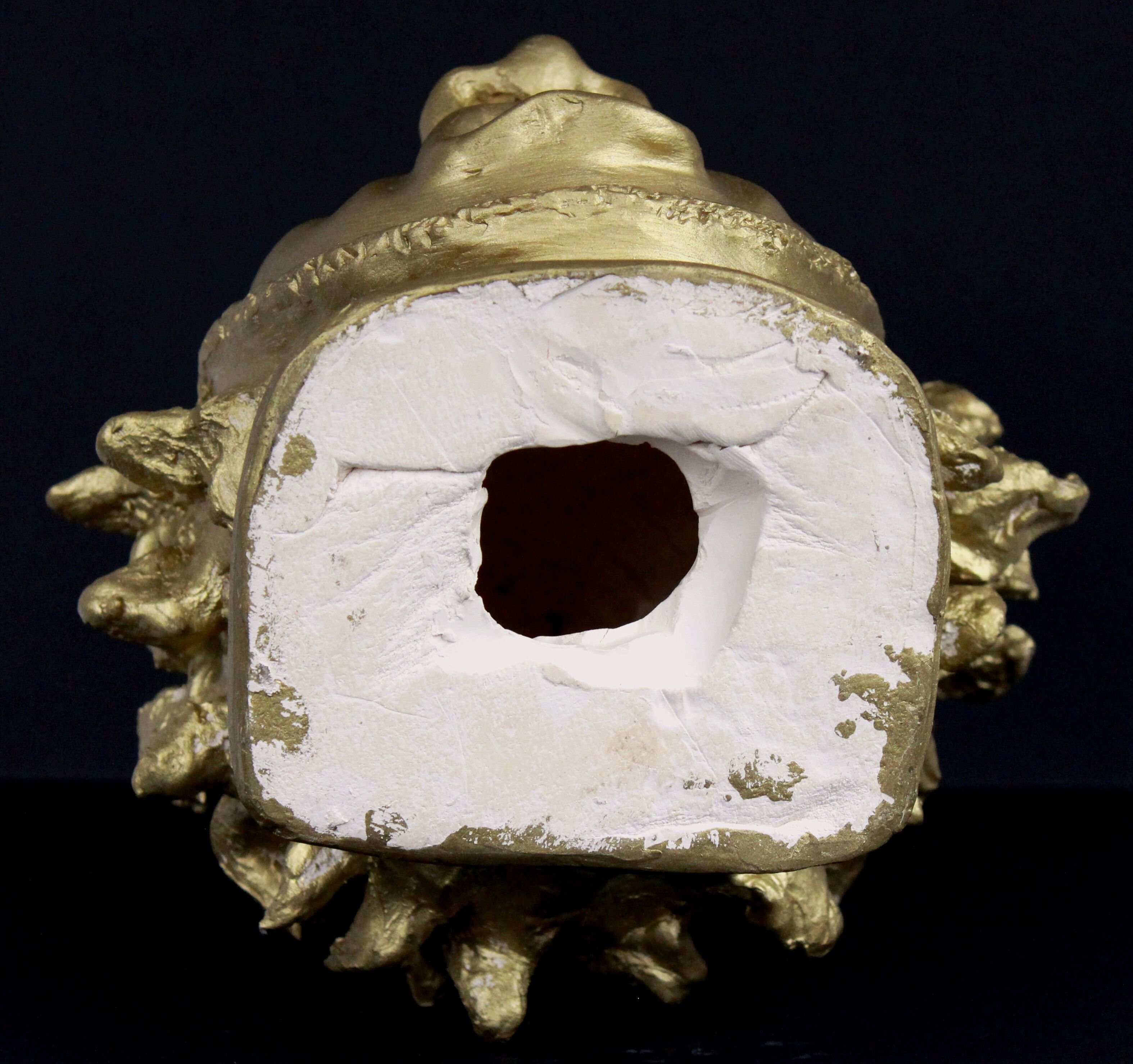 Head plaster gold paint