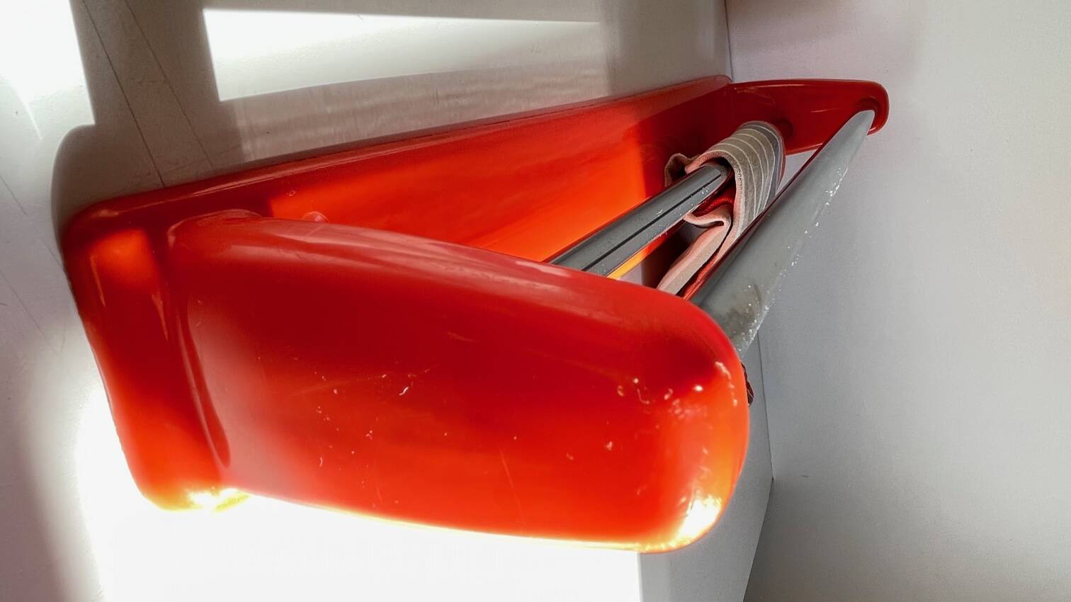 Orange towel rack by Syla from the 70s