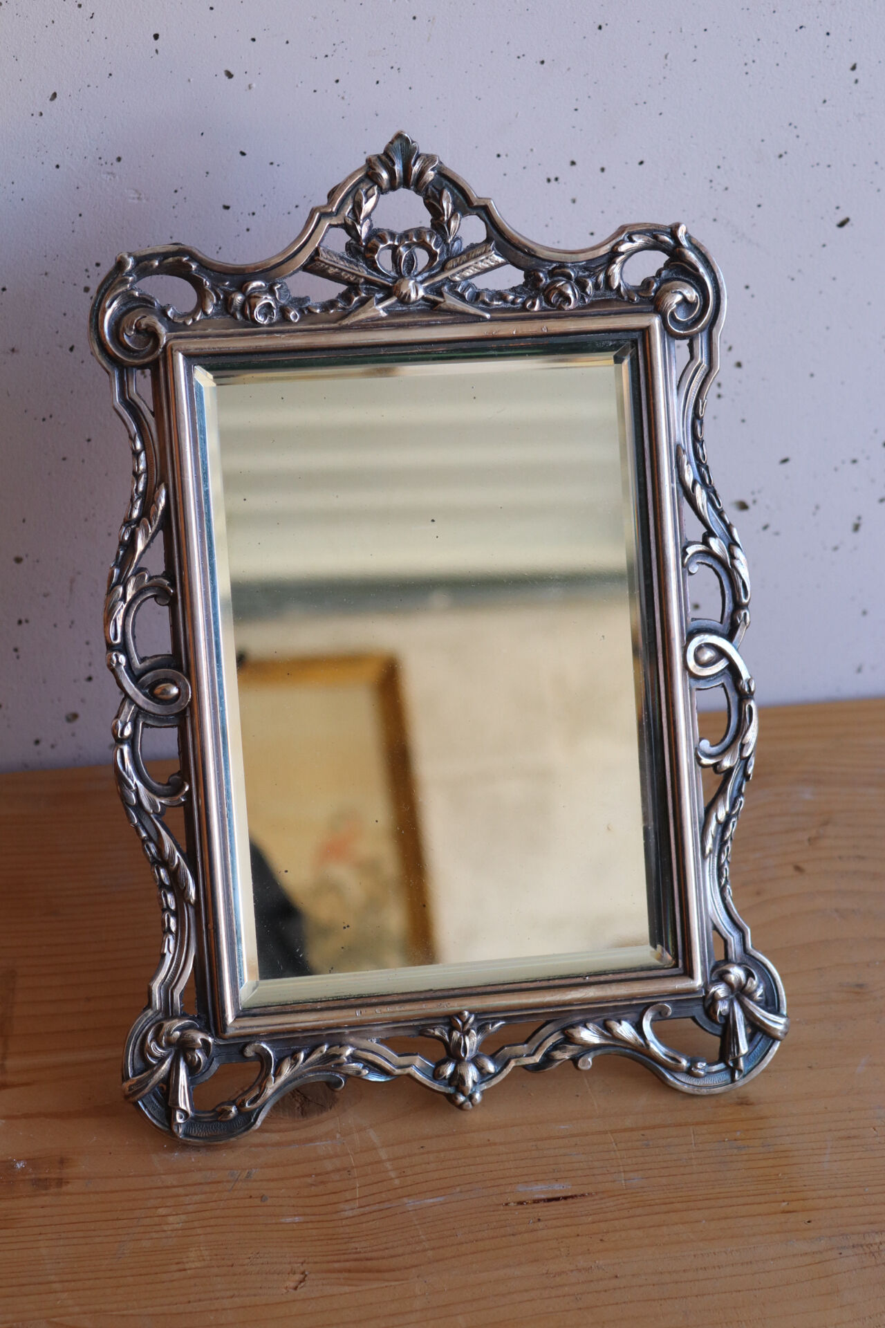 Small antique table mirror in Louis XVI style, silver-plated metal.