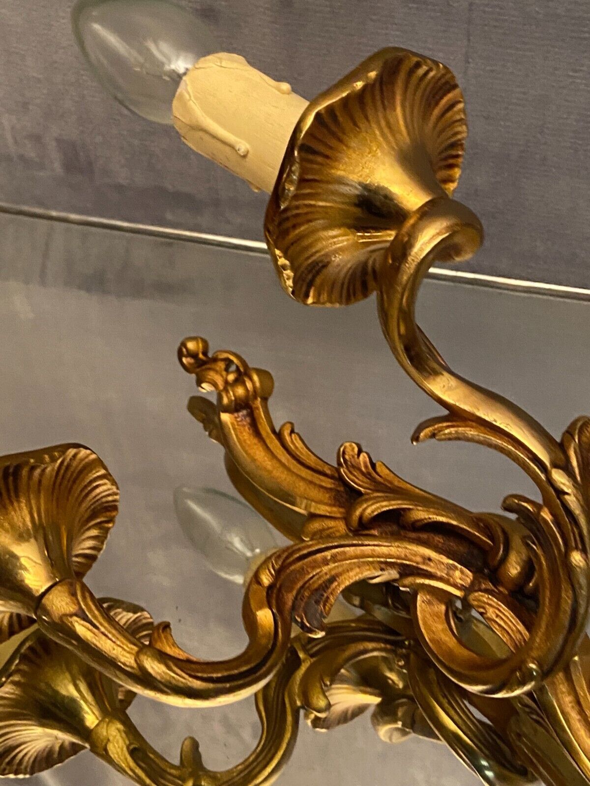 Pair of Louis XV style gilded bronze sconces