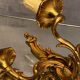 Pair of Louis XV style gilded bronze sconces