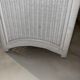 White rattan bedroom set: chest of drawers, mirror, bed, basket