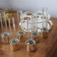 Vials and silver-plated vodka servant