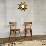 Pair of vintage clear beech baumann chair