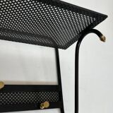 Coat rack in black lacquered metal, perforated sheet metal and brass in the style of Mathieu Matégot