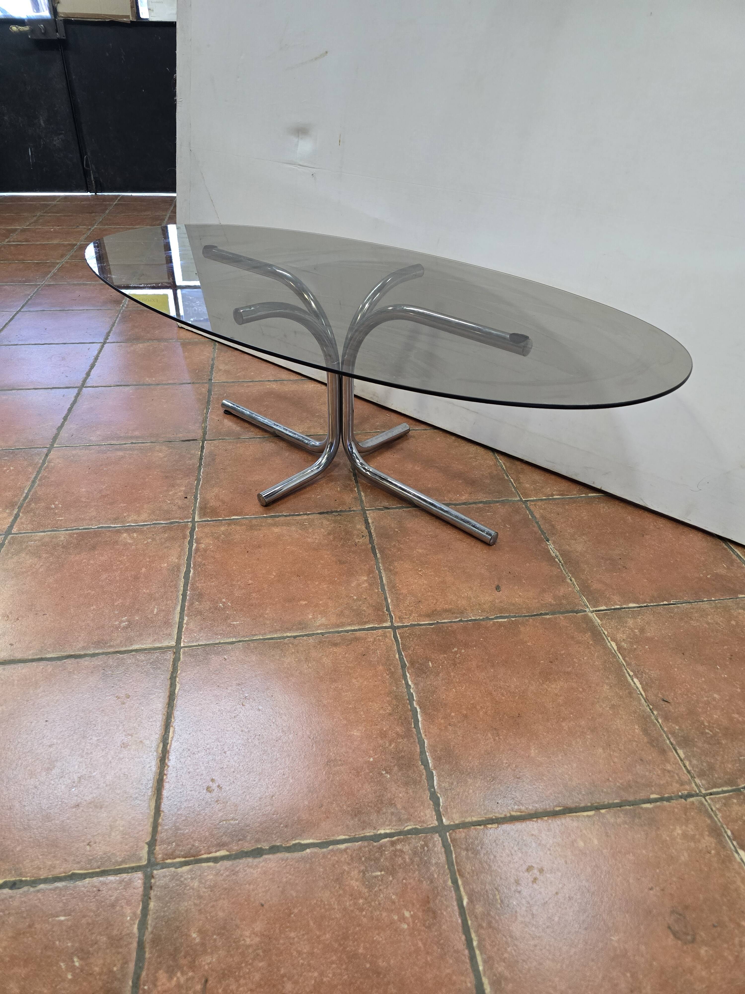 Coffee table with chrome base and smoked glass from the 70s