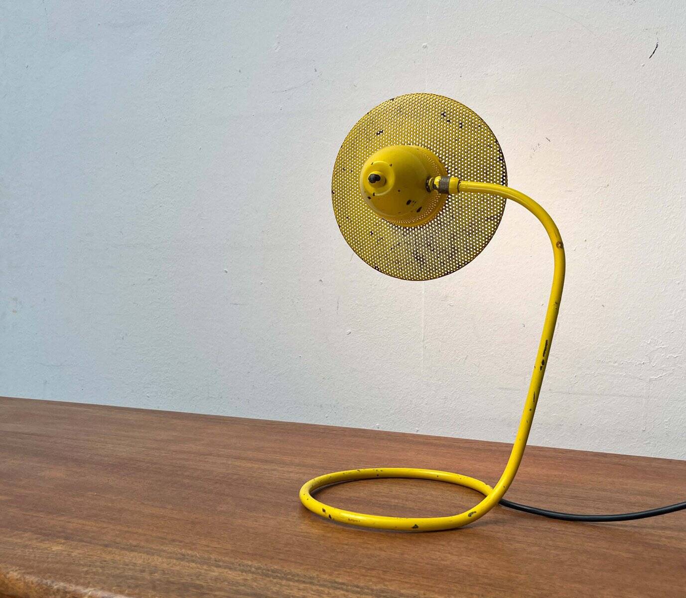 Perforated metal table lamp in Mid-Century Modern style, in the style of Mathieu Matégot, 1960s.