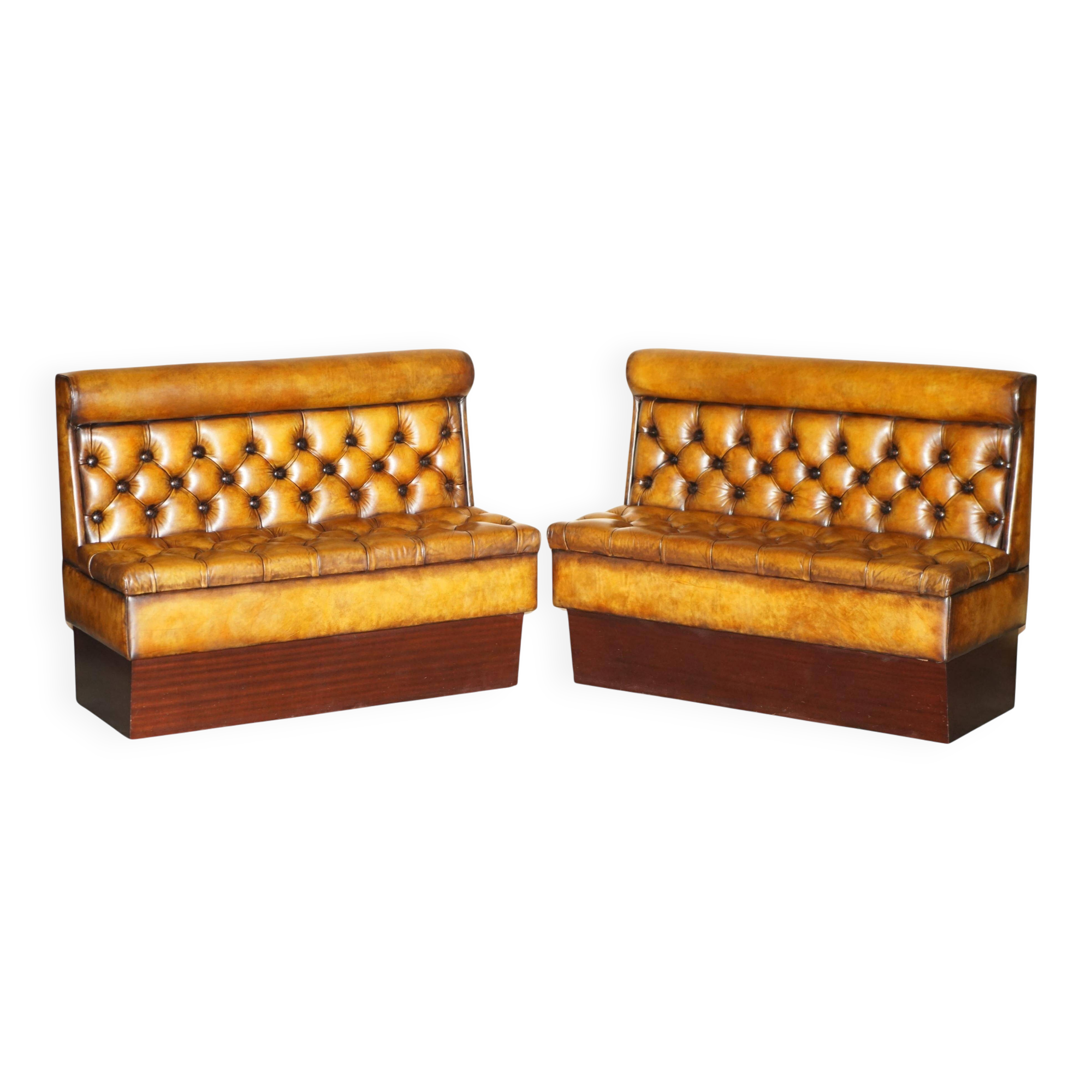 Pair of Victorian Chesterfield pub benches in leather.