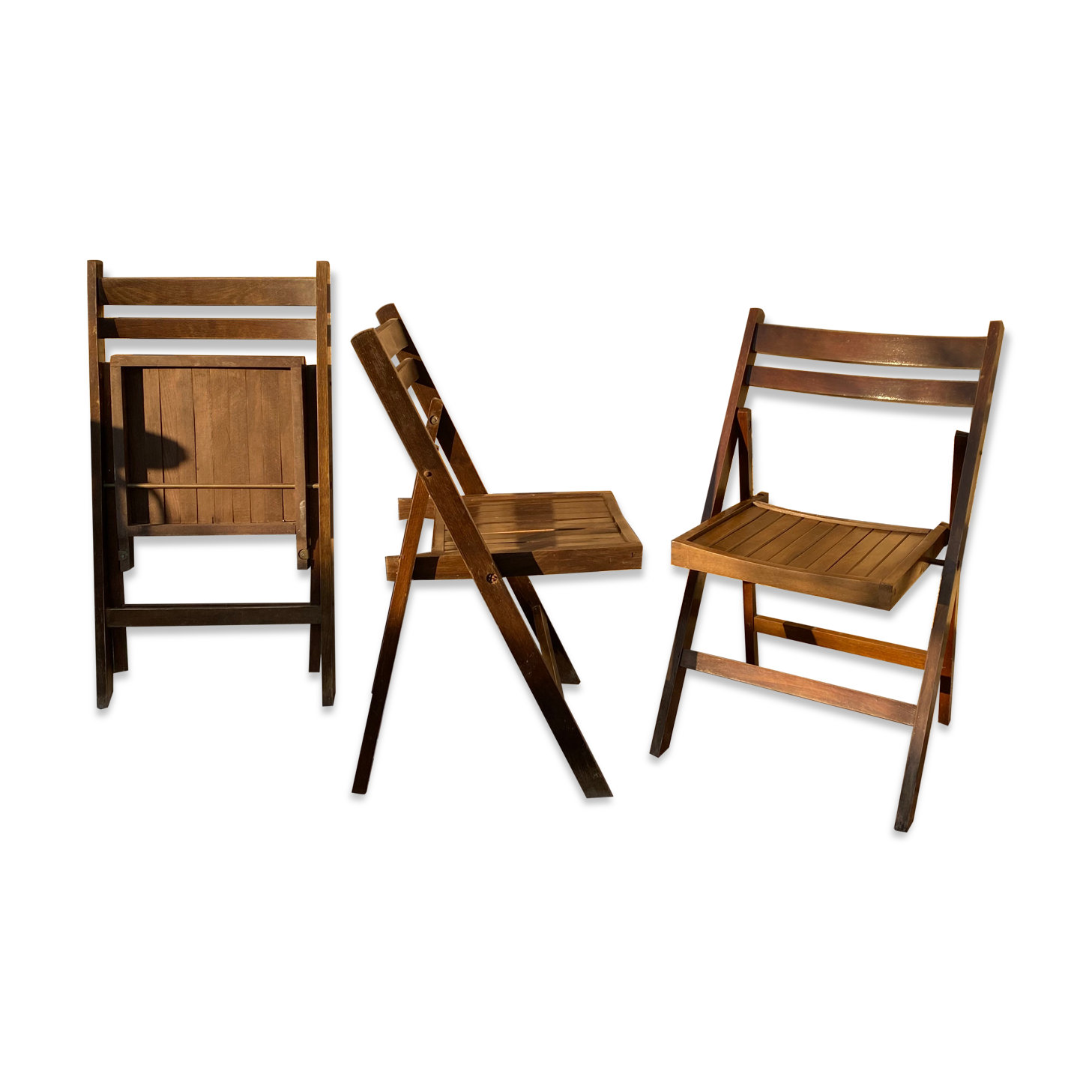 Three wooden folding chairs