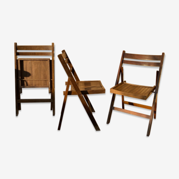 Trois chaises pliantes bois